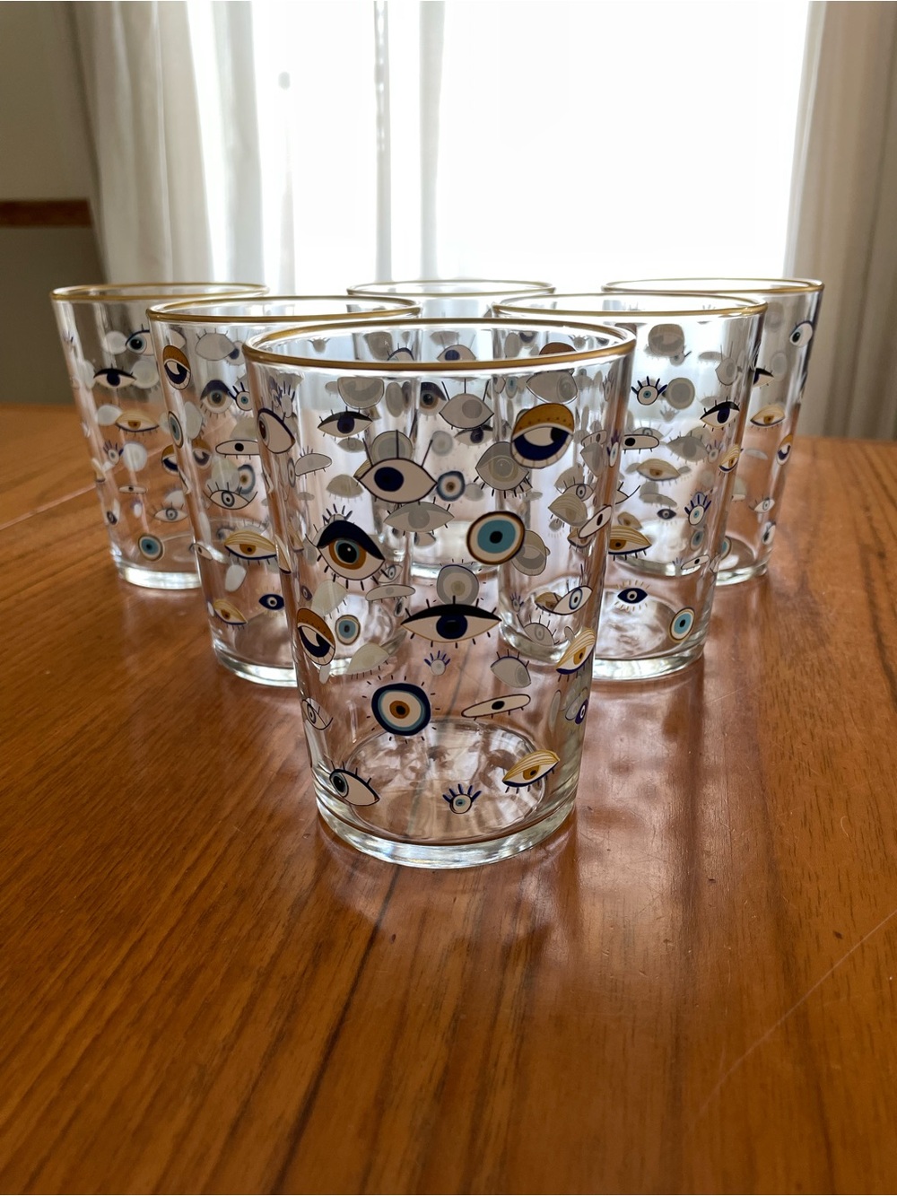 Evil Eye Drinking Glasses With Gold Rims from Anthropologie